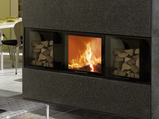 Inserted wood stove in the wall