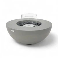 Ronde grijze bio-ethanol vuurtafel met bronzen glaskiezels en windscherm