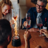 H&ouml;fats SPIN Air 1200 matzwarte bio-ethanol tafelhaard met hoog cilindervormig glas