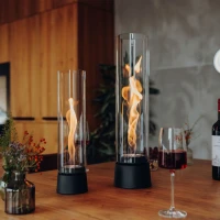 H&ouml;fats SPIN Air 900 matzwarte bio-ethanol tafelhaard met hoog cilindervormig glas en roterende vlam