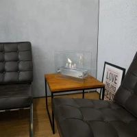 Tafel biohaard in glas met een stalen brander. Brandtijd: 2-3 uur. Maat: H: 28 x B: 35 x D: 12 cm