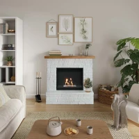 Vrijstaande elektrische haard van TAGU met schouwdesign en witte baksteenlook

