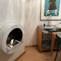 Witte ronde bio-ethanol haard voor de muur